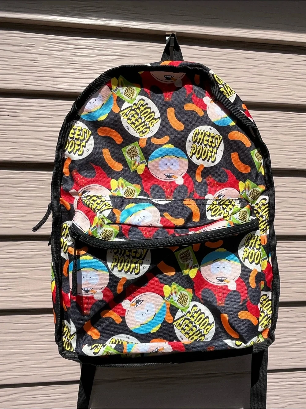 South Park Eric Cartman Cheesy Poofs Reversible Flip Pak Backpack Character Bag